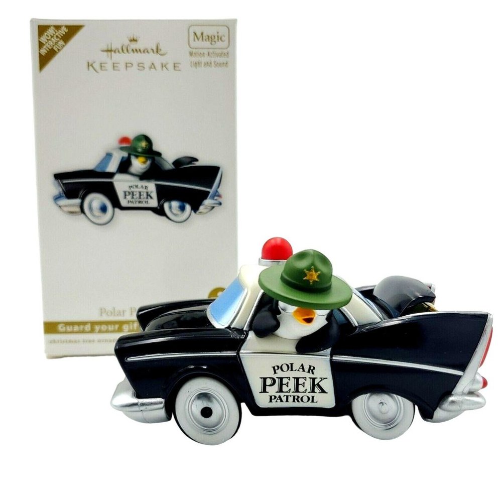 Hallmark Ornament Polar Peekbuster 2010 Motion-Activated Police Car Penguin Cop